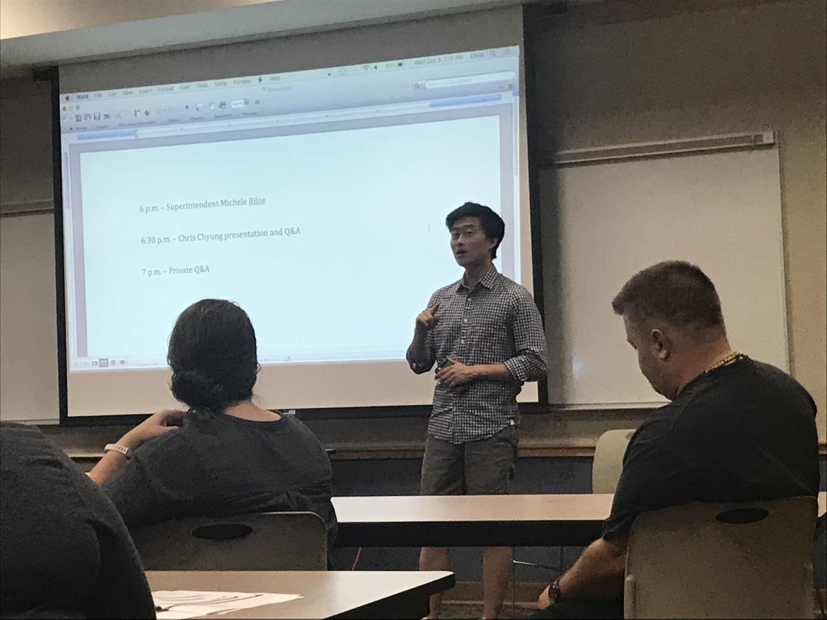 State Rep. Chris Chyung, D-Dyer, takes questions from the Griffith community in a State of Our Schools conversation Wednesday night at the Griffith-Calumet Township Branch of the Lake County Public LIbrary. Staff photo by Carley Lanich