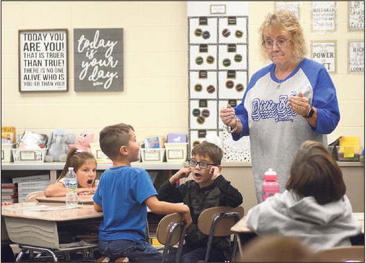 A part of what the referendum will fund: Vigo County School Corporation elementary school counselor Monica Tener-Smith listens as Dixie Bee Elementary first-graders shout “No” as part of a state-mandated child safety course on Friday at the school. For the Nov. 5 election, Vigo County voters are being asked to approve a school operational referendum that will provide funds for school counselors, like Tener-Smith, along with school protection officers and nurses. Staff photo by Joseph C. Garza

