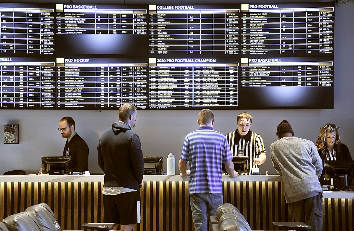The Book sports betting facility at Harrah’s Hoosier Park Racing & Casino has taken in more than $3.5 million in wagers in its first two months of operation. Staff photo by John P. Cleary