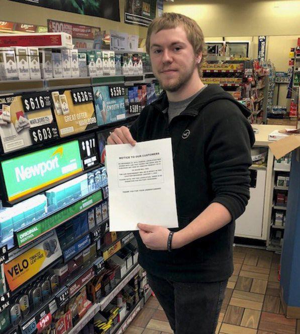 Smoker: John Smithson, 20, is critical of a new federal law that means he can no longer legally purchase tobacco products. Staff photo by Sue Loughlin