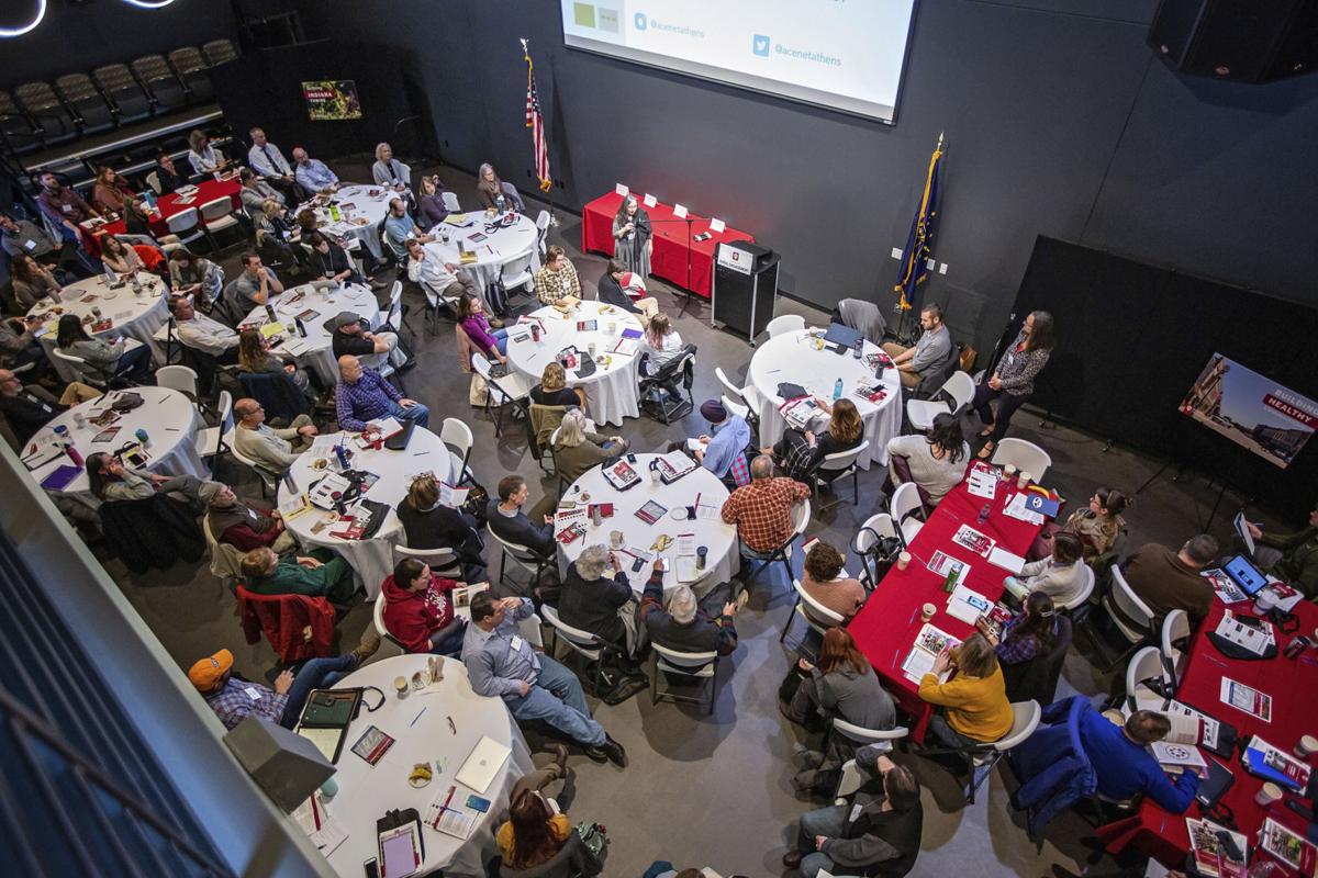 Leslie Schaller, director of programs at Appalachian Center for Economic Networks in Athens, Ohio, (center near red table) talks at the Indiana Uplands Winter Food Conference in Bedford. Courtesy photo by Jeni Waters