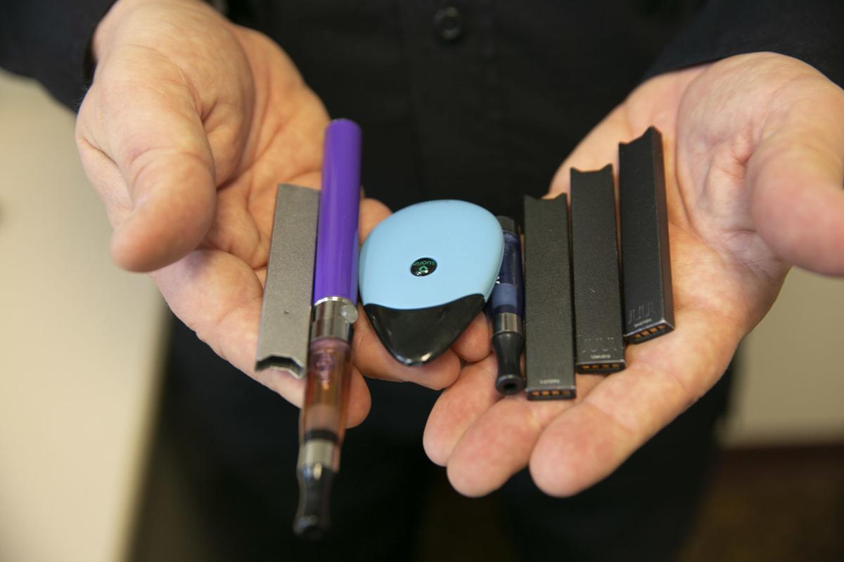 These electronic cigarettes were confiscated at Mishawaka High School. The school is starting a new anti-vaping program. Mishawaka High school resource officer Lt. Tim Williams shows some of the confiscated items. Staff photo by Santiago Flores