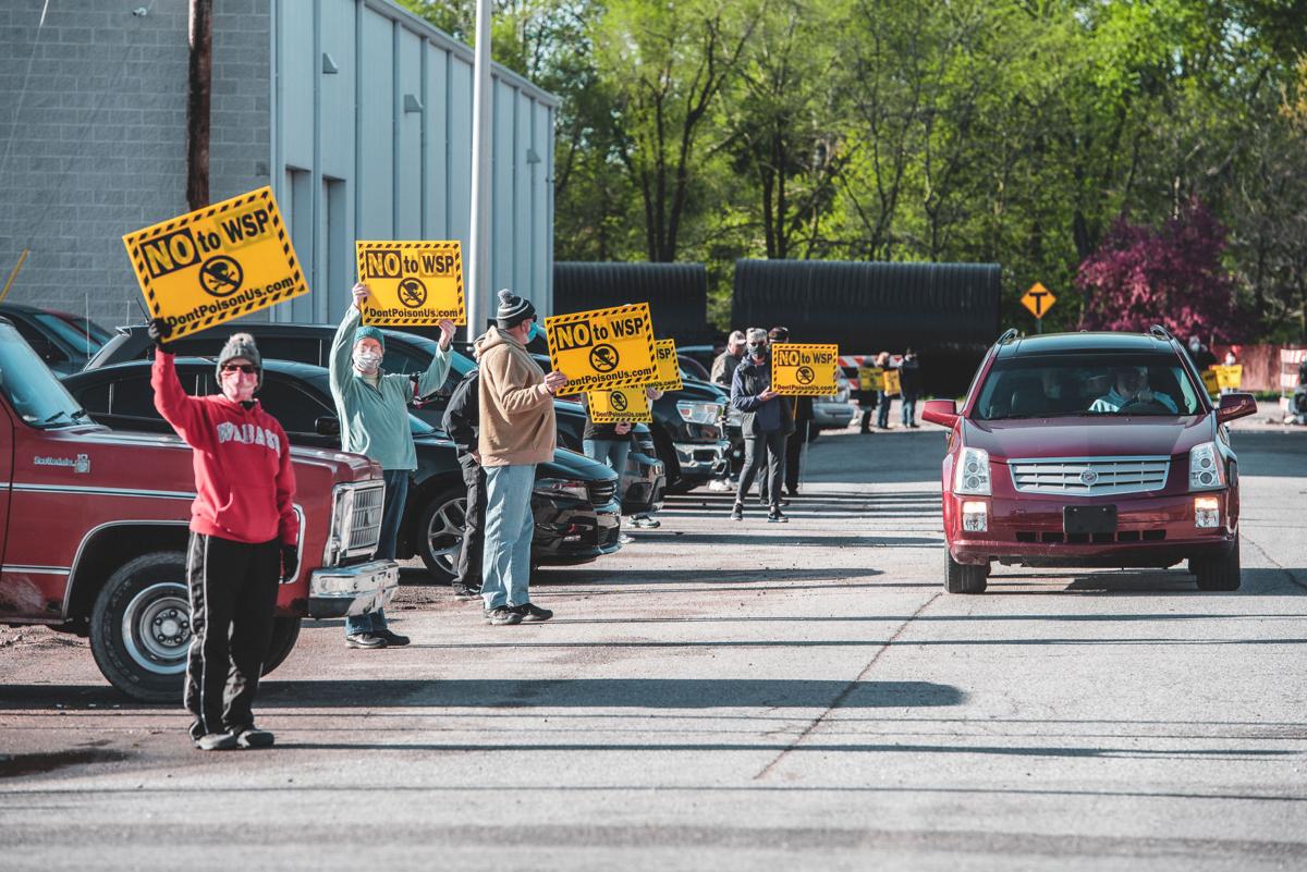 Protesters lined the street in front of Iron Horse Broadcasting in Logansport on Wednesday morning to voice their opinions on the proposed WSP plant in Cass County, Staff photo by Tony Walters