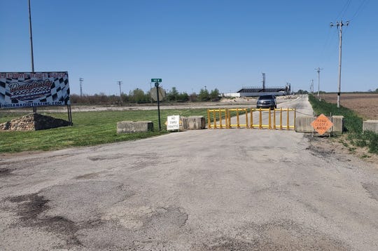 Benton County police set up barricades to the Daugherty Speedway entrance at County Road 650 South on Friday, May 8, to prevent the dirt track from staging races initially scheduled for Saturday, May 9. The state issued a cease-and-desist order, saying the races would have been a violation of Gov. Eric Holcomb's stay-at-home orders during the coronavirus pandemic. Owner Michael Daugherty said he would comply with the state's order but protested county actions to block access to his track. (Photo provided by Michael Daugherty)