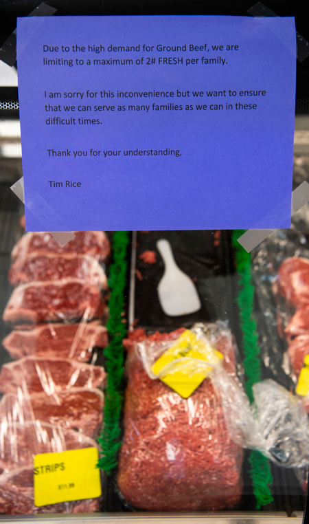 A sign on the fresh meat case notified cstomers of the 2-pound limit on ground beef last week at Rice's Quality Farm Meats Inc. in Spencer. Staff photo by Rich Janzaruj