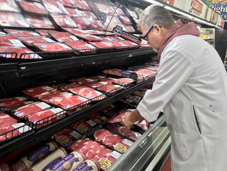 Ray Saylor, who has been a butcher for 42 years, said that ground beef prices are approaching $7 per pound at Cash Saver in Jeffersonville. Staff photo by John Boyle