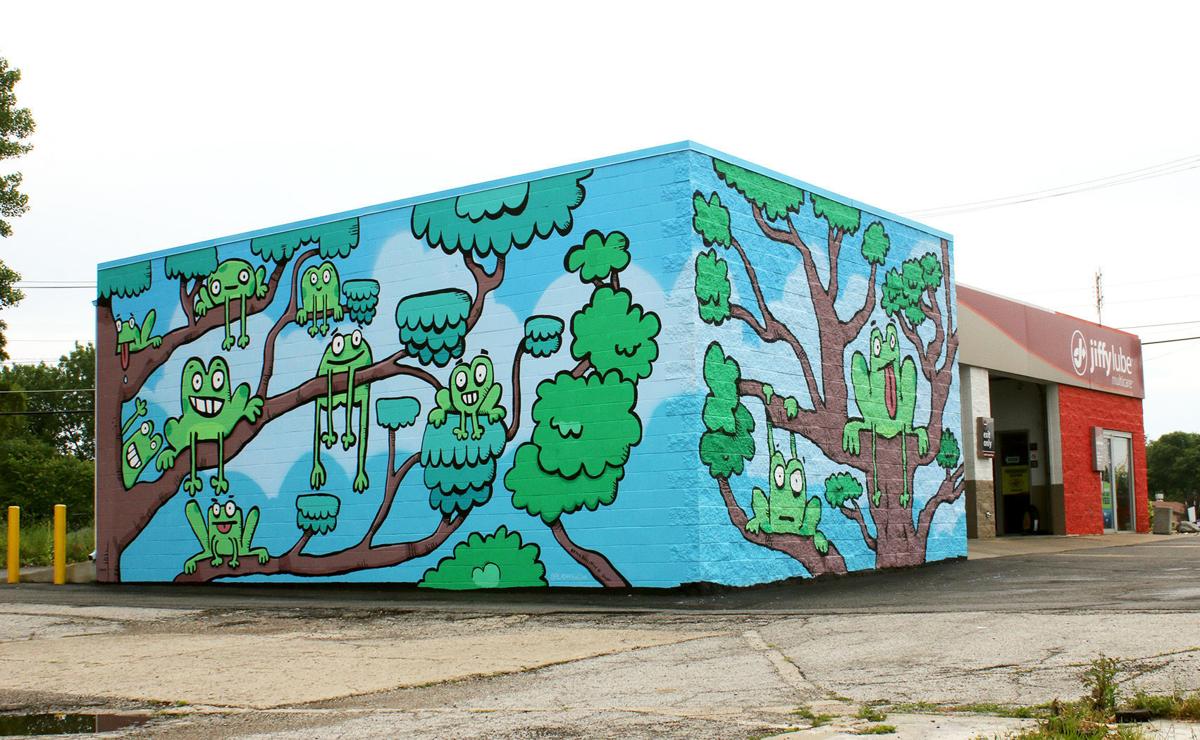 A new frog-filled mural has been painted on Jiffy Lube in Kendallville as part of the company's statewide public art program. Staff photo by Andy Barrand