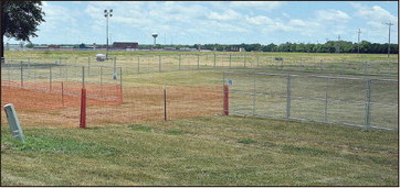 For or against: A fenced-in area for protesters has been set up on the grounds of the Federal Correctional Complex which is seen here on Friday along Indiana 63. Tribune-Star/Joseph C. Garza