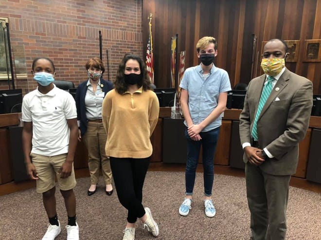 The Evansville City Council on Monday passed a resolution in support of creating a Youth City Council. Pictured are (from left) Jordan Barksdale of North High School Natalie Fehrenbacher of Central High School, Leslie Martin of Central High School, Tim Dwyer of Signature School and Evansville City Council President Alex Burton.