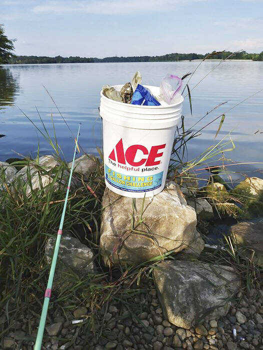  A member brings a bucket on a fishing trip to Turtle Creek Reservoir. Photo courtesy of Scot Reeder