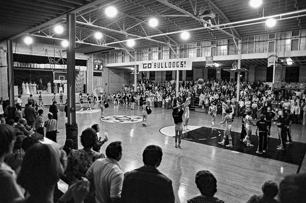 Cannetlon hosts Whitesville, KY in a homecoming game in 1977. Note the queen’s court on the stage at the far left of the gymnasium. Photo courtesy of Michael Keating
