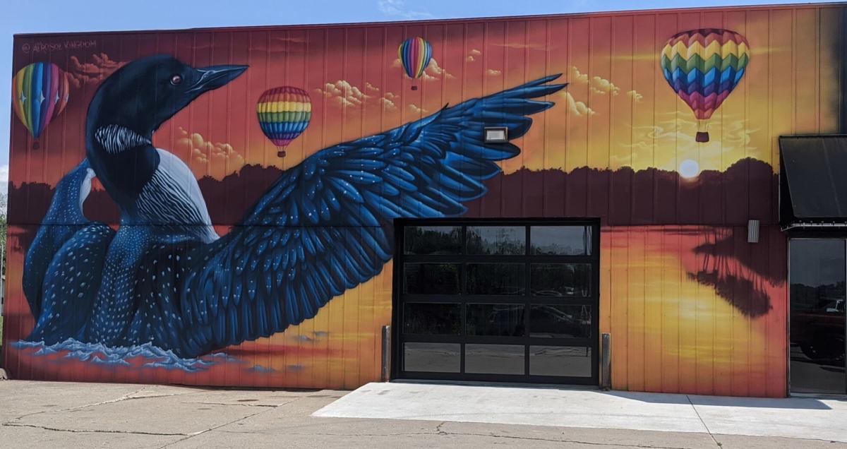 Steuben County's mural for the Make It Your Own Mural Fest is officially complete. New York artist Justin Suarez put the finishing touches on the mural over Labor Day weekend, drawing inspiration in part from seeing the name Loon Lake on a Steuben County map. Staff photo by Ashlee Hoos
