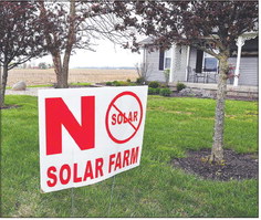 Curt and Becky Harrison don’t want a solar farm next to their house along County Road 450 North. Staff file photo by John P. Cleary
