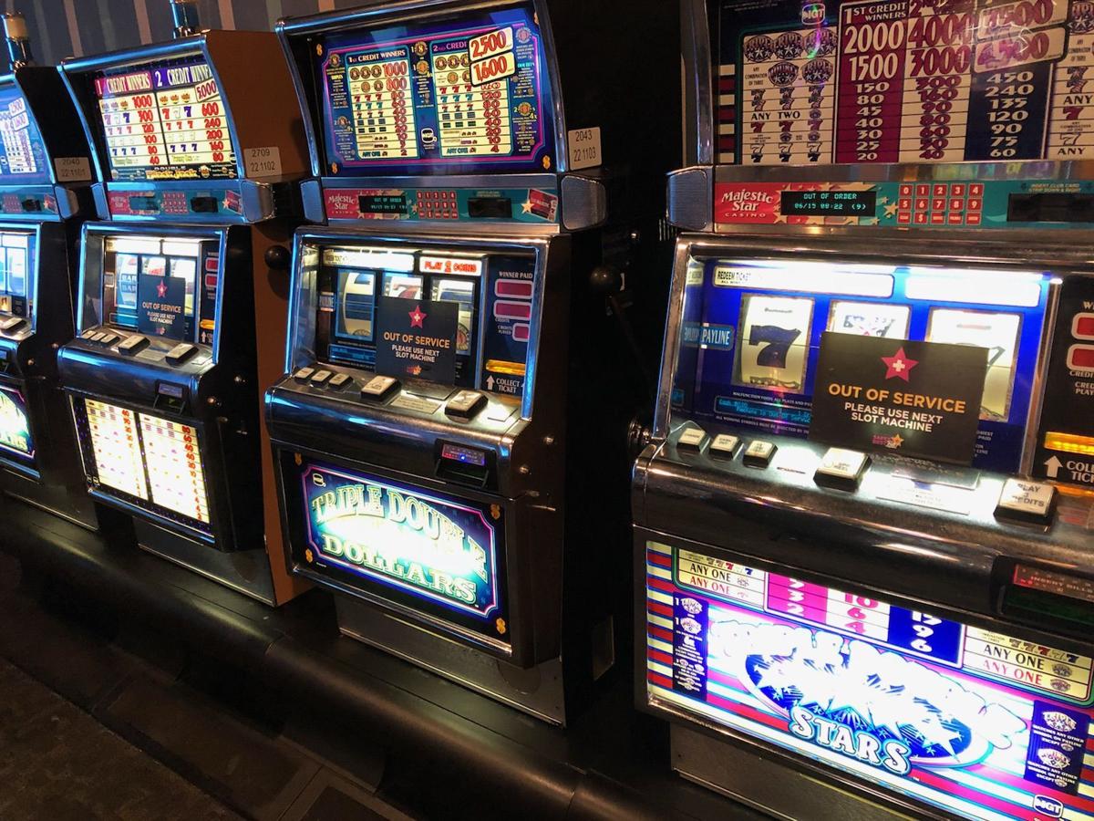 Some slot machines at the Majestic Star Casino in Gary are out of service  to maintain 6 feet of social distancing between players amid the coronavirus pandemic. Staff file photo by Dan Carden