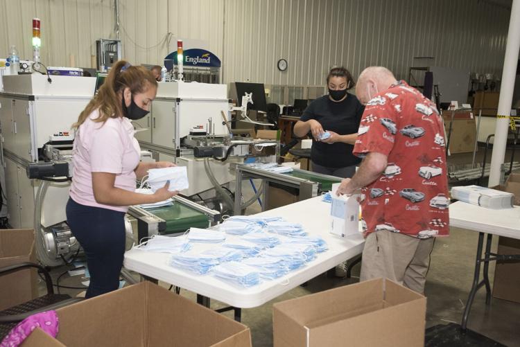Getting the product ready: A small team at Jordan Manufacturing in Monticello can produce 60 to 70 masks per minute. CNHI News Indiana photo by Tony Walters