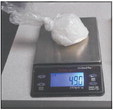 Methamphetamine, totaling 49 grams, is weighed on a scale on Tuesday, Feb. 12, 2019, in Logansport. Photo provided by the Logansport Police Department