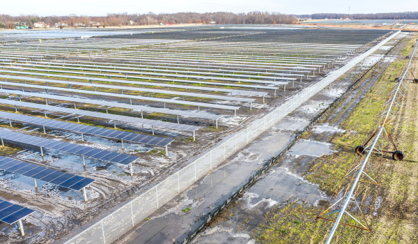 This solar farm under construction northeast of South Bend covers only 210 acres. The installation being built by Indiana & Michigan Power is much smaller than the controversial farms planned elsewhere in the state. (Photo by Rob Franklin)