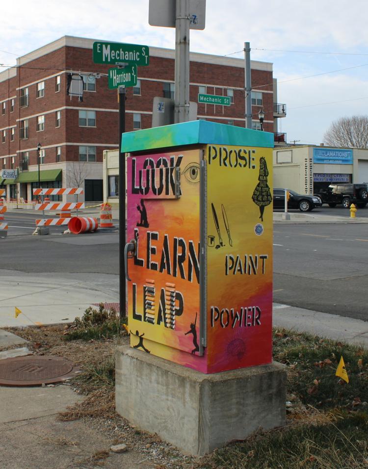 The Board of Works approved an amendment to a contract with INDOT Tuesday morning that would allow the Blue River Community Foundation to place more vinyl covers on traffic signal cabinets, like this one on the corner of Mechanic and Harrison Streets. Staff photo by 
By HANNAH GUNNELL 