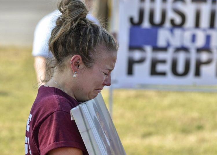 Death penalty opponent and attorney Ashley Kincaid Eve is shown demonstrating against the execution of Christopher Vialva on Thursday, Sept. 24, 2020, across the street from the U.S. Penitentiary in Terre Haute.  Staff file photo by Austen Leake