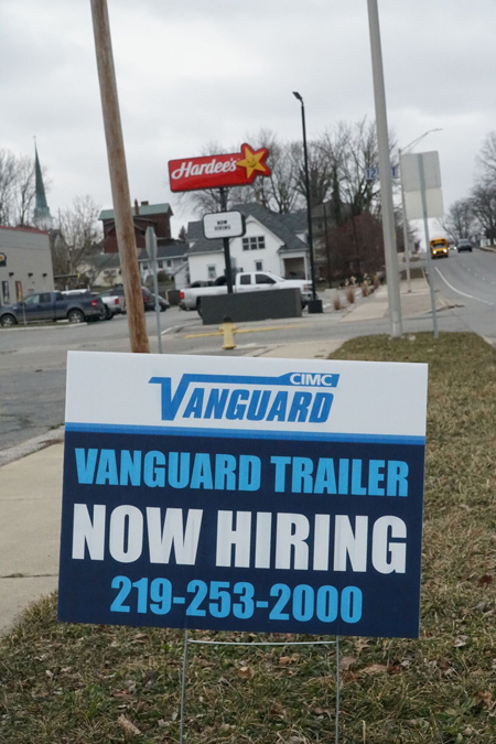 On East Market Street in Logansport, the Hardee's has a call for employees on its sign in the background on a yard sign by Vanguard advertising for employees. Staff photo by James D. Wolf Jr.