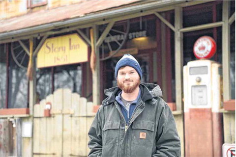 Second-generation owner Rich Hofstetter stands in front of Story Inn. He partnered with Jacob and Kate Ebel in the business after his father passed away in 2019. Hofstetter became sole owner last fall. Staff photo by Abigail Youmans