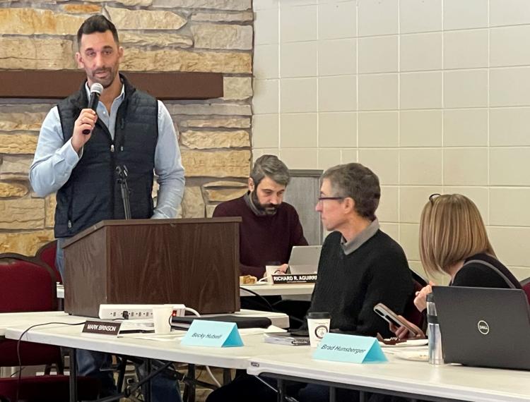 Goshen Mayor Jeremy Stutsman, left, speaks during a special multi-family housing policy work session hosted by the Goshen City Council and Goshen Redevelopment Commission early Friday morning at Shanklin Park’s Schrock Pavilion. Staff photo by John Kline
