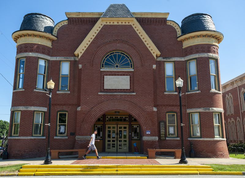 A man walks along Indiana Avenue, in front of the Memorial Opera House in Valparaiso Friday July 17, 2020. A plan to use $5.5 million in ARPA funds was given an unfavorable opinion by the state's public access counselor. Staff photo by Andy Lavalley/Post-Tribune