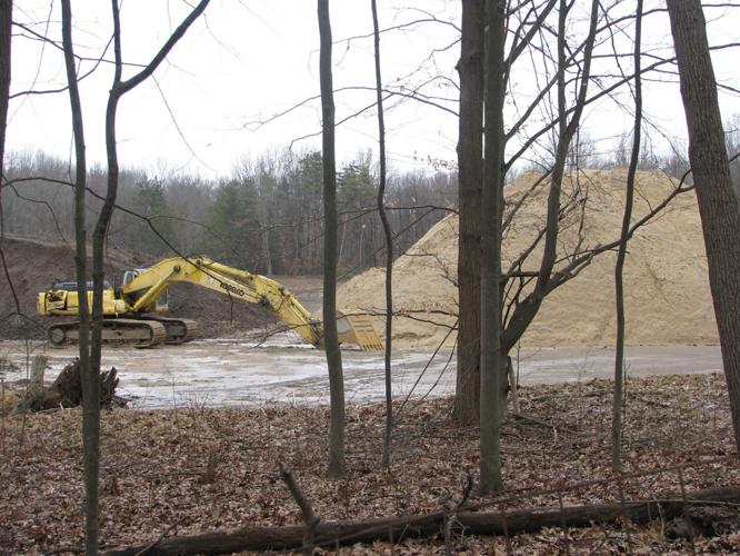 Neighbors have long claimed the site on Schultz Road is an illegal sand mine, and La Porte County has again issued a stop-work order. File photo