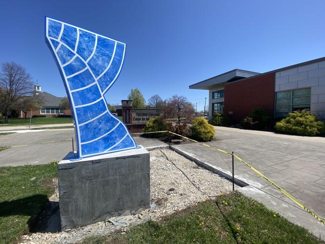 Twisted Botanical Wave, made of aluminum and metallic paint, was sculpted by New Jersey artist Mary Angers and was installed Thursday in front of Vincennes University's Art and Design building as part of the 2021 First City Public Sculpture Exhibition. Staff photo by Jenny McNeece