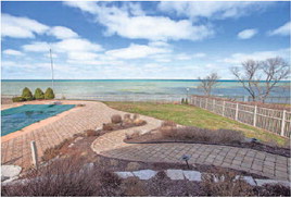 The view from a home listed for sale at $4.9 million is shown March 28 in New Buffalo. Much of the demand for waterfront properties is being driven by Chicago-area buyers. Staff photo by Robert Franklin