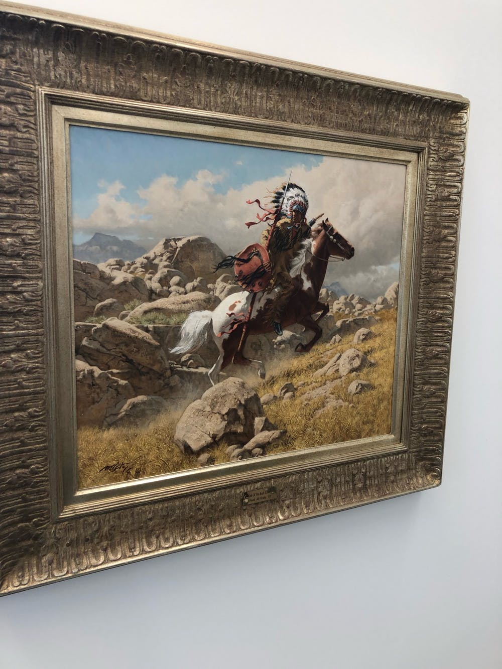 A painting hangs on the wall at the newly opened Boren Art Gallery at Taylor. Photo provided
