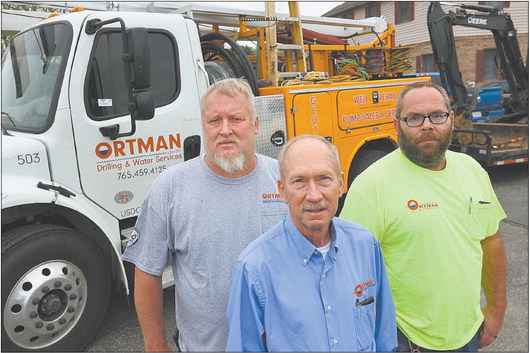 Russell McDorman is shown with Rick Ortman and Mark Ortman, all of Ortman Drilling and Water Service, which is celebrating 100 years in business. Tim Bath | Kokomo Tribune