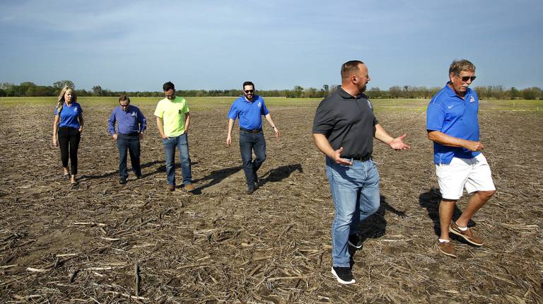 Cedar Lake town officials (l to r) Julia Rivera, town councilwoman, Bob Carnahan, town councilman, Don Oliphant, Christopher Burke Engineering, Chris Salatas, town manager, Randy Niiemeyer, town council president, ad Bob Gross, President, Cedar Lake Enhancement Association, during a tour of the area where the new de-watering location will be during dredging in Cedar Lake on Thursday, May 12, 2022. (John Smierciak/Post Tribune)