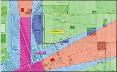 The Indianapolis Airport Authority is working to buy nearly 60 acres, shown in the map in the two blue hatched areas to the left and bottom of the words “Steele Property,” just east of the Indianapolis Regional Airport in western Hancock County. The airport may need to reorient its north-south runway from the existing main runway in a manner shaded in purple, which would require the additional land. Submitted image