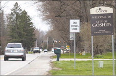 A vehicle passes the ‘Welcome to City of Goshen’ sign along Ind. 15 near Bethany Christian Schools in Goshen. Joseph Weiser | The Goshen News
