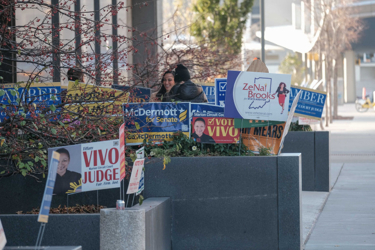 Candidate signs greet voters outside the polling place at the City-County Building. (IBJ photo/Eric Learned)