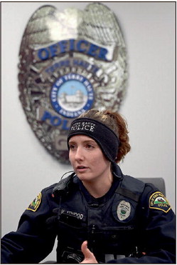 Terre Haute Police Department Officer Hanna Atwood talks about her father’s influence in becoming a police officer on Friday at the THPD headquarters. Atwood, an Indiana State University graduate, has been with the department since February of 2021. Tribune-Star/Joseph C. Garza