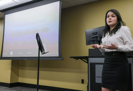 Purdue Northwest students hosted a panel on climate change as part of their final exam. Isabelle Sebastian had a segment on water pollution. Staff photo by John J. Watkins