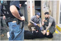Officials with the Greenfield Police Department are taking part in a Tactical Medicine (TACMED) class this week at GPD and at the old jail. Officials say the training goes into much greater depth than standard first aid. They’ll cover severe injuries like gunshot wounds, stab wounds, amputations and other severe-blood-loss scenarios to help keep people alive until EMS can get there. They had several of these instances in the past year that highlight the need. Staff photo by Tom Russo