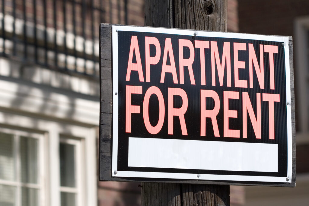  Close-up of a sign in front an apartment building. (Getty Images)
