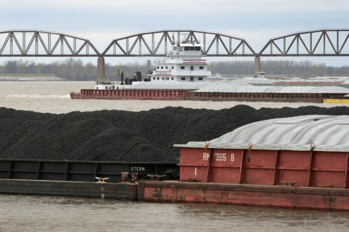  A barge loaded with Illinois Basin coal sits in the Ohio River. (Scott Olson/Getty Images)