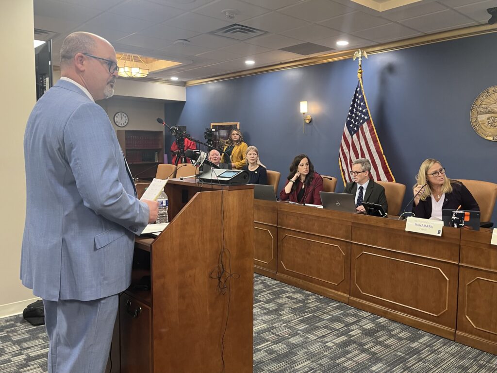 Rep. Heath VanNatter (R-Kokomo) introduces a bill decriminalizing the possession of two ounces of marijuana before a House committee. (Whitney Downard/Indiana Capital Chronicle)
