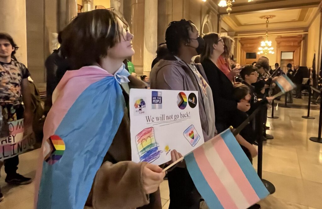  Silver Farrell, 14, protests against a bill that would ban gender-affirming medical care for minors in Indiana. (Whitney Downard/Indiana Capital Chronicle)