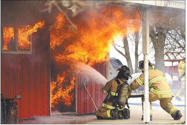Burlington, Russiaville and Forest volunteer fire departments in Howard County responded to a blaze that resulted in a total loss. Photo by Tim Bath, Kokomo Tribune