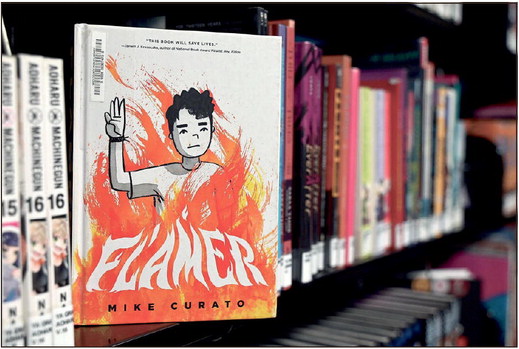 Mike Curato’s “Flamer” was on the American Library Association’s Top 13 Most Challenged Books of 2022 list. It’s seen here on Thursday, May 11, 2023 in the Vigo County Public Library. Tribune-Star/Joseph C. Garza