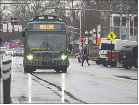 A Red Line Interurban Trolley heads north on Main Street in Goshen on a rainy day in April 2022. Changes are being proposed for Trolley services in Elkhart County. Joseph Weiser | The Goshen News