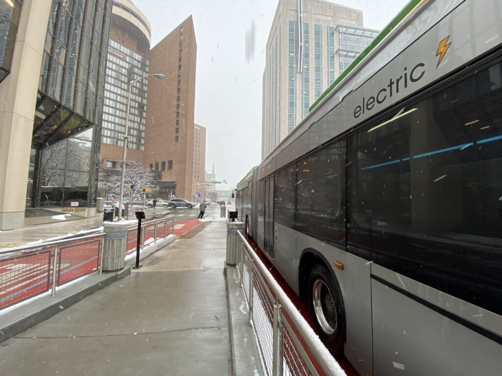 The Red Line, at a stop opposite the Statehouse, on a snowy day in 2022. (Courtesy IndyGo)
