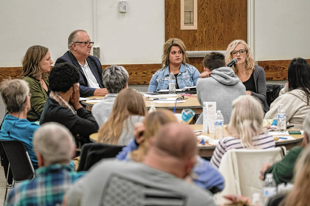 Lena Blackstock, from left, of Process/Practice Studio, moderates a panel discussion on homelessness in Columbus with Kelly Daugherty, executive director of Love Chapel, Megan Cherry, executive director of Anchor House in Seymour, and Diane Doup, community outreach at Lincoln-Central Neighborhood Family Center, at Donner Center in Columbus,, Thursday, Nov. 17, 2023. Staff photo by Mike Wolanin