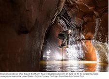 Red Bull athlete visits Bedford to ride electric surfboard through Bluespring Caverns