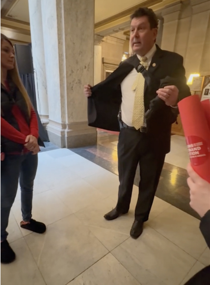 Rep. Jim Lucas, R-Seymour, opened his coat and flashed a handgun to a group of high school students at the Indiana Statehouse after Moms Demand Action Advocacy Day. 
Screenshot by Kyra Howard, TheStatehouseFile.com.